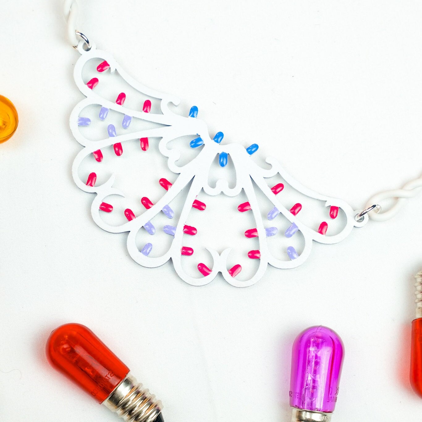 Festone: Collier in legno a forma di Luminaria Salentina