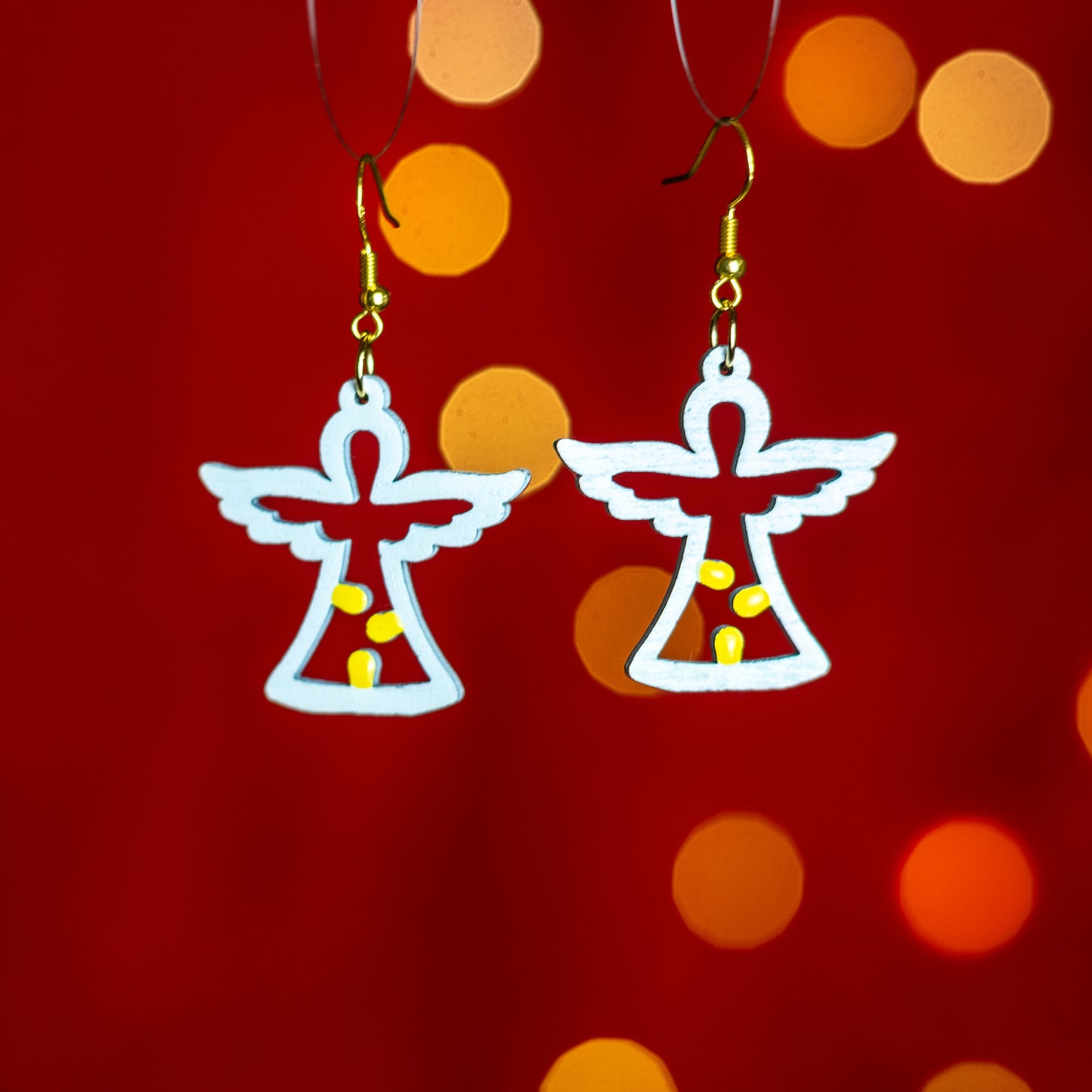 Angioletto: Orecchini in legno a forma di Luminaria Salentina