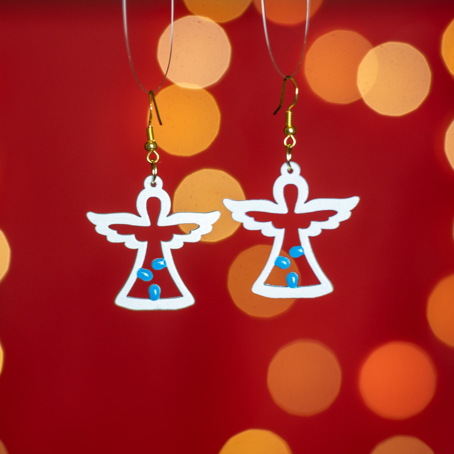 Angioletto: Orecchini in legno a forma di Luminaria Salentina