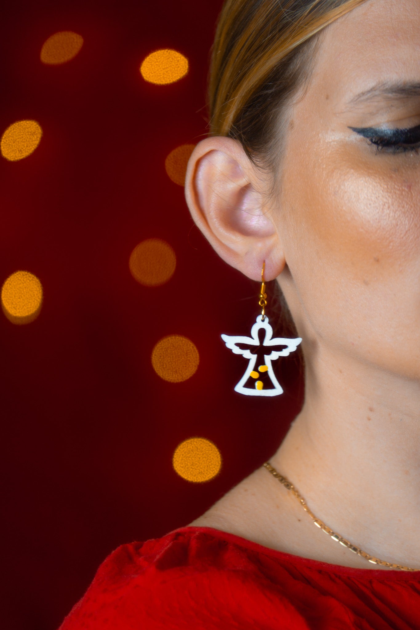 Angioletto: Orecchini in legno a forma di Luminaria Salentina