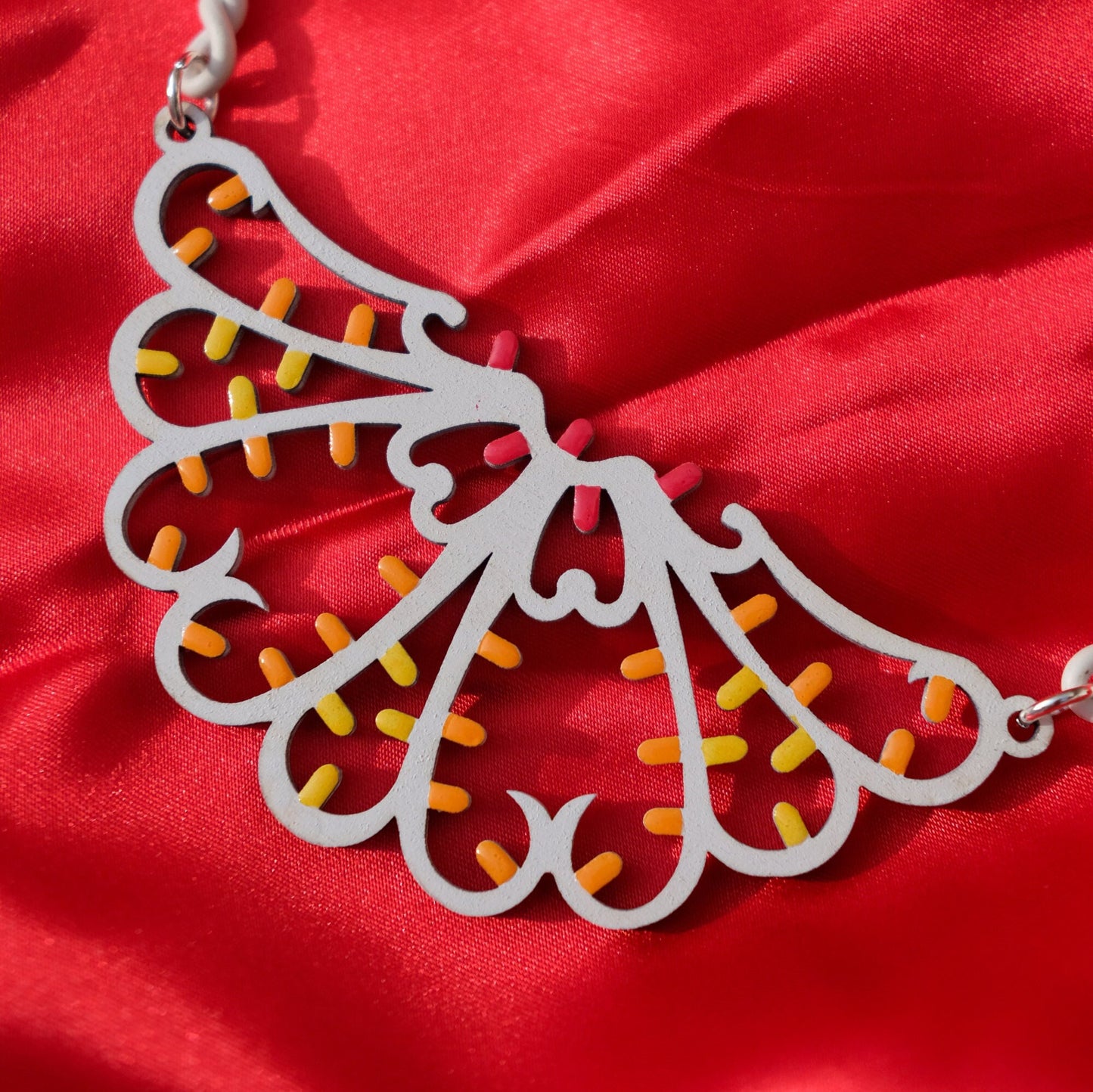 Festone: Collier in legno a forma di Luminaria Salentina